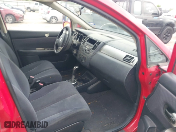 2009 Nissan Versa 1.8 S with VIN 3N1BC13EX9L489250, listed as a IAAI auction lot 41940250 with 185,575 mi miles. Bid and sale history available at carsss.com. Image 5.