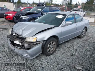 1999 Acura TL with VIN 19UUA5657XA021688, listed as a IAAI auction lot 41997466 with 241,232 mi miles. Bid and sale history available at carsss.com. Image 2.