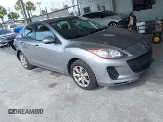 2012 Mazda 3 i Sport z VIN JM1BL1UF2C1521563, wystawiony jako IAAI lot #42341913 z przebiegiem 148 679 mil mil oraz . Historia ofert i sprzedaży dostępna na DreamBid. Obrazek 1.