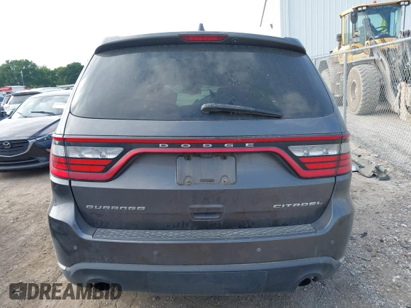 2014 Dodge Durango Citadel with VIN 1C4RDHEG2EC381324, listed as a IAAI auction lot 42021611 with 104,178 mi miles and . Bid and sale history available at DreamBid. Image 16.