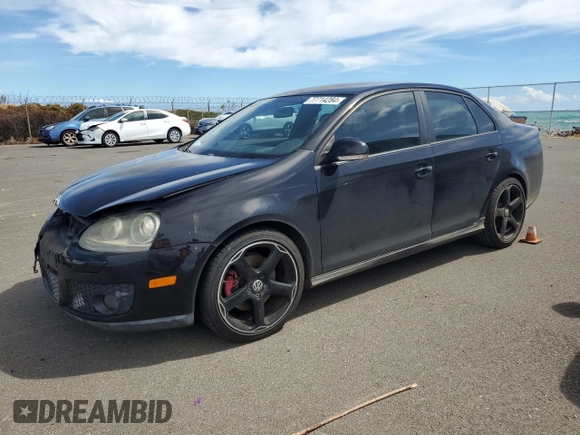 2009 Volkswagen Jetta GLI z VIN 3VWBJ71K19M071374, wystawiony jako Copart lot #77714284 z przebiegiem 61 434 mil mil oraz Szkoda całkowita • Salvage title. Historia ofert i sprzedaży dostępna na DreamBid. Obrazek 1.
