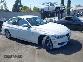 2015 BMW 3 Series 320i with VIN WBA3B1C51FK141223, listed as a IAAI auction lot 42348487 with 19,583 mi miles and . Bid and sale history available at DreamBid. Image 1.