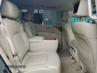 2012 Infiniti QX56 7-passenger z VIN JN8AZ2NE6C9021661, wystawiony jako Copart lot #54956795 z przebiegiem 106 037 mil mil oraz Tytuł czysty. Historia ofert i sprzedaży dostępna na DreamBid. Obrazek 11.