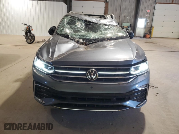 2023 Volkswagen Tiguan SEL R-Line with VIN 3VV4B7AX3PM072402, listed as a Copart auction lot 56656515 with 13,686 mi miles and Salvage title. Bid and sale history available at DreamBid. Image 5.