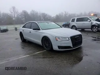 2016 Audi A8 3.0T z VIN WAU34AFD5GN014679, wystawiony jako Copart lot #86691744 z przebiegiem 119 422 mil mil oraz Szkoda całkowita • Salvage title. Historia ofert i sprzedaży dostępna na DreamBid. Obrazek 11.