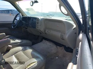 1999 GMC Yukon with VIN 1GKEK13R3XJ717999, listed as a IAAI auction lot 41870187 with 179,855 mi miles. Bid and sale history available at carsss.com. Image 5.