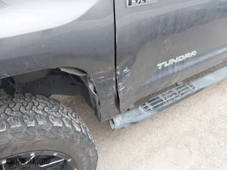 2014 Toyota Tundra 2WD Truck SR5 with VIN 5TFEY5F1XEX159036, listed as a IAAI auction lot 41279153 with 170,693 mi miles. Bid and sale history available at carsss.com. Image 6.