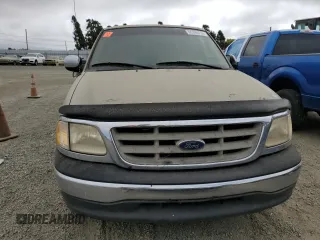 2000 Ford F-150 XL with VIN 1FTRX17L3YKB07018, listed as a Copart auction lot 66998714 with 0 mi miles and Salvage Title. Bid and sale history available at carsss.com. Image 5.
