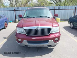 2004 Lincoln Navigator Luxury with VIN 5LMFU28R14LJ15068, listed as a IAAI auction lot 42078597 with 150,294 mi miles. Bid and sale history available at carsss.com. Image 6.