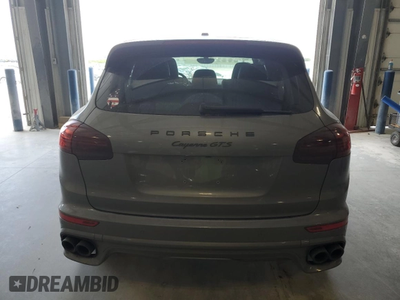 2016 Porsche Cayenne GTS с VIN WP1AD2A2XGLA80001, выставлен на аукционе Copart как лот 56706455 с пробегом 71 816 миль миль и Списание • Salvage title. История ставок и продаж доступна на DreamBid. Изображение 6.