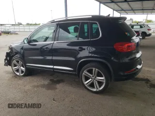 2015 Volkswagen Tiguan R-Line with VIN WVGAV7AX3FW064500, listed as a Copart auction lot 54745215 with 103,406 mi miles and Salvage Title. Bid and sale history available at DreamBid. Image 2.