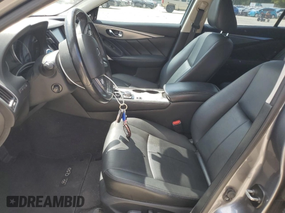 2017 Infiniti Q50 Premium z VIN JN1EV7APXHM732252, wystawiony jako Copart lot #50937795 z przebiegiem 109 219 mil mil oraz Szkody całkowita. Historia ofert i sprzedaży dostępna na DreamBid. Obrazek 7.