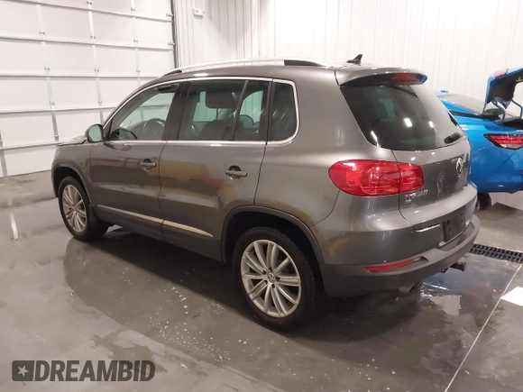 2016 Volkswagen Tiguan SE z VIN WVGBV7AX3GW507850, wystawiony jako IAAI lot #41303866 z przebiegiem 97 989 mil mil oraz . Historia ofert i sprzedaży dostępna na DreamBid. Obrazek 3.