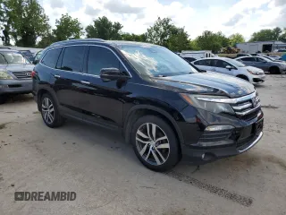 2017 Honda Pilot Touring with VIN 5FNYF6H99HB018503, listed as a Copart auction lot 63087025 with 369,312 mi miles and Clean title. Bid and sale history available at DreamBid. Image 4.