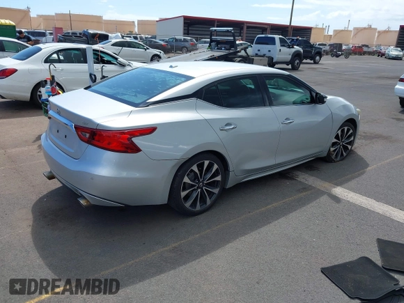 2016 Nissan Maxima SV with VIN 1N4AA6AP5GC395274, listed as a IAAI auction lot 41616698 with 102,736 mi miles and . Bid and sale history available at DreamBid. Image 4.