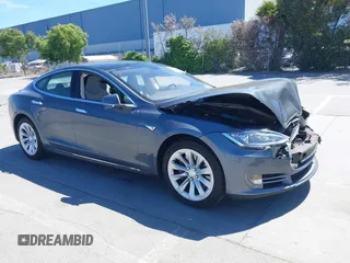 2014 Tesla Model S 60 z VIN 5YJSA1H17EFP33910, wystawiony jako IAAI lot #42346934 z przebiegiem Nie podano mil oraz . Historia ofert i sprzedaży dostępna na DreamBid. Obrazek 1.