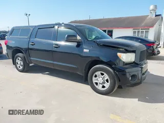 2013 Toyota Tundra z VIN 5TFDY5F16DX292418, wystawiony jako IAAI lot #41531030 z przebiegiem 236 555 mil mil oraz . Historia ofert i sprzedaży dostępna na DreamBid. Obrazek 1.