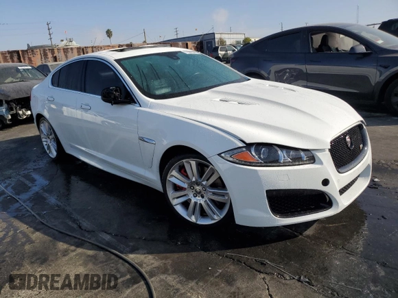 2013 Jaguar XF with VIN SAJWA8JC7DMS77243, listed as a Copart auction lot 77583544 with Not Provided miles and Salvage Title. Bid and sale history available at DreamBid. Image 4.