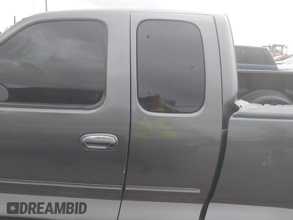 2003 Ford F-150 XL with VIN 1FTRX17W93NB63496, listed as a IAAI auction lot 42406687 with Not provided miles and . Bid and sale history available at DreamBid. Image 13.