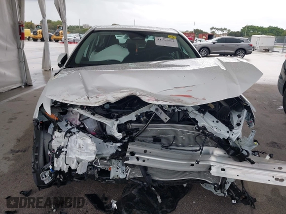 2025 Toyota Camry LE with VIN 4T1DAACK9SU112515, listed as a IAAI auction lot 41932562 with 587 mi miles and . Bid and sale history available at DreamBid. Image 6.