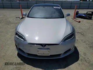 2016 Tesla Model S 90D с VIN 5YJSA1E23GF144496, выставлен на аукционе Copart как лот 64080845 с пробегом 34 847 миль миль и Списание • Salvage title. История ставок и продаж доступна на DreamBid. Изображение 5.