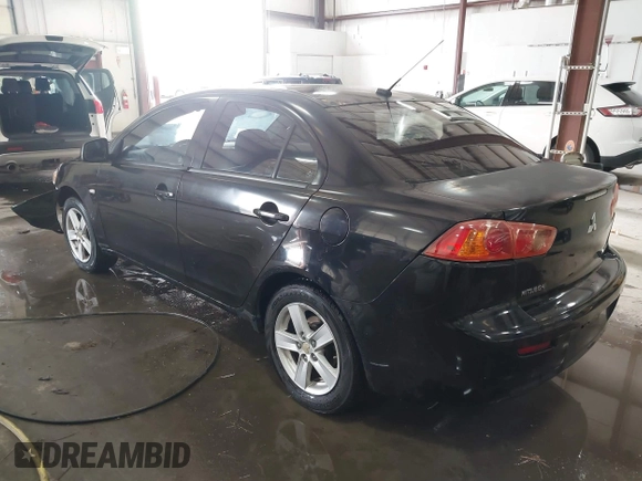 2008 Mitsubishi Lancer DE with VIN JA3AU26UX8U015865, listed as a IAAI auction lot 41108329 with 131,884 mi miles. Bid and sale history available at carsss.com. Image 3.