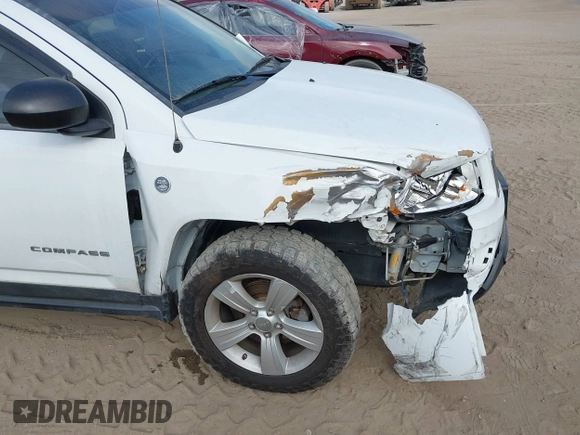 2012 Jeep Compass Latitude with VIN 1C4NJDEB9CD612599, listed as a IAAI auction lot 41582214 with 138,312 mi miles. Bid and sale history available at carsss.com. Image 12.