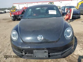 2012 Volkswagen Beetle 2.0T Turbo with VIN 3VWV67ATXCM648515, listed as a IAAI auction lot 41666994 with 142,085 mi miles. Bid and sale history available at carsss.com. Image 13.