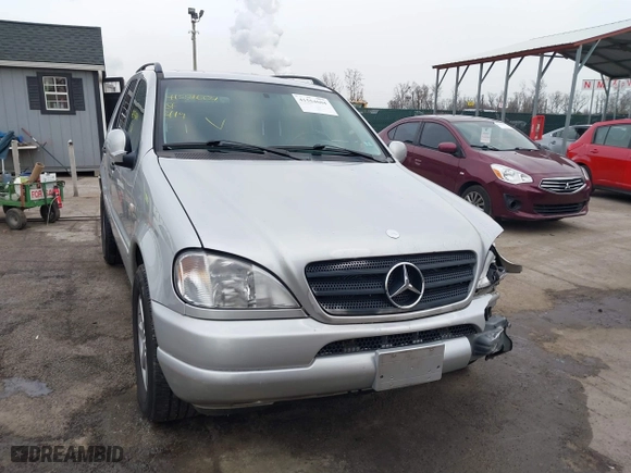 1999 Mercedes-Benz M-Class with VIN 4JGAB72E4XA113675, listed as a IAAI auction lot 41554604 with 230,092 mi miles. Bid and sale history available at carsss.com. Image 12.