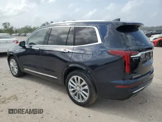 2022 Cadillac XT6 Premium Luxury z VIN 1GYKPERS4NZ105532, wystawiony jako Copart lot #51960895 z przebiegiem 99 336 mil mil oraz Szkoda całkowita • Salvage title. Historia ofert i sprzedaży dostępna na DreamBid. Obrazek 2.