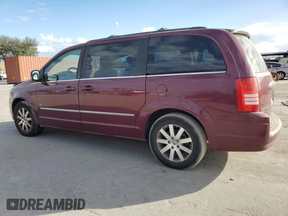2009 Chrysler Town & Country Touring with VIN 2A8HR54X79R640084, listed as a Copart auction lot 85050984 with 167,072 mi miles and Salvage Title. Bid and sale history available at DreamBid. Image 2.