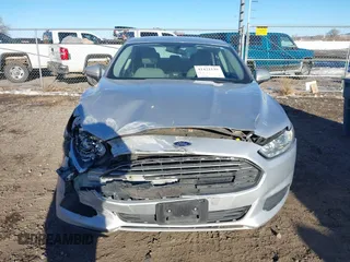 2015 Ford Fusion S Hybrid with VIN 3FA6P0UU7FR307568, listed as a IAAI auction lot 41421139 with 152,186 mi miles. Bid and sale history available at carsss.com. Image 13.