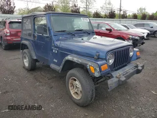 2002 Jeep Wrangler X z VIN 1J4FA39S32P767598, wystawiony jako Copart lot #55974555 z przebiegiem 177 793 mil mil oraz Czysty tytuł • Clean title. Historia ofert i sprzedaży dostępna na DreamBid. Obrazek 4.