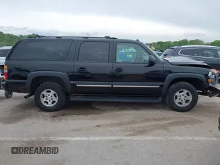 2004 Chevrolet Suburban LT z VIN 1GNFK16ZX4J291419, wystawiony jako IAAI lot #42163331 z przebiegiem 235 054 mil mil oraz . Historia ofert i sprzedaży dostępna na DreamBid. Obrazek 13.