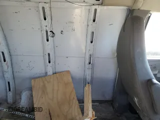 2011 Chevrolet Express Cargo Van with VIN 1GCWGGFAXB1150161, listed as a Copart auction lot 86826564 with 261,863 mi miles and Salvage Title. Bid and sale history available at carsss.com. Image 11.
