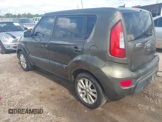 2012 Kia Soul + with VIN KNDJT2A67C7376281, listed as a IAAI auction lot 41955049 with 231,635 mi miles. Bid and sale history available at carsss.com. Image 3.