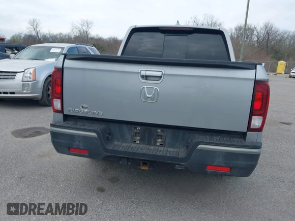 2019 Honda Ridgeline RTL with VIN 5FPYK2F50KB004055, listed as a IAAI auction lot 41576975 with 128,620 mi miles and . Bid and sale history available at DreamBid. Image 16.