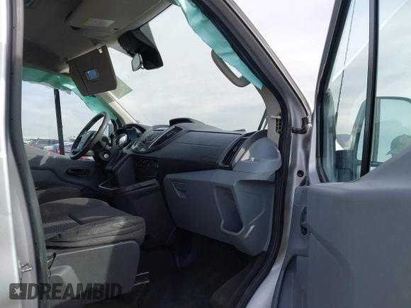 2015 Ford Transit XL z VIN 1FMZK1YMXFKA97523, wystawiony jako IAAI lot #40971108 z przebiegiem 253 712 mil mil oraz . Historia ofert i sprzedaży dostępna na DreamBid. Obrazek 5.