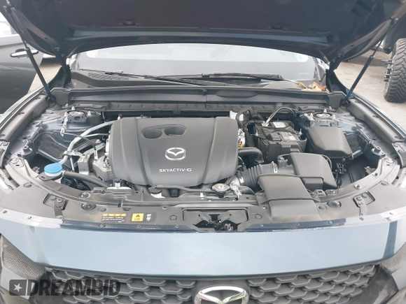 2024 Mazda CX-50 S Select with VIN 7MMVABAM8RN220180, listed as a IAAI auction lot 40608590 with 3,203 mi miles and . Bid and sale history available at DreamBid. Image 10.