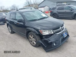 2014 Dodge Journey Limited with VIN 3C4PDDDG6ET118355, listed as a IAAI auction lot 42030856 with 164,740 mi miles and . Bid and sale history available at carsss.com. Image 1.