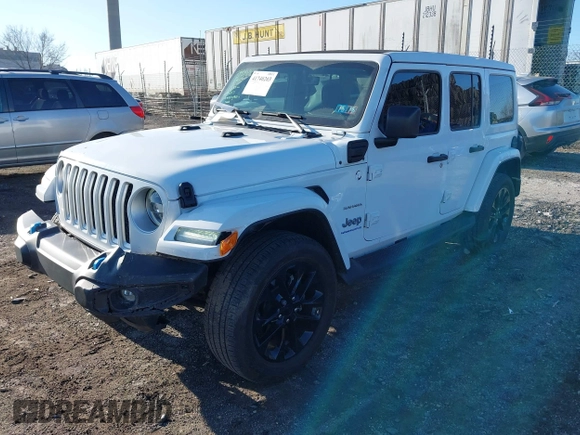 2023 Jeep Wrangler Sahara z VIN 1C4JJXP6XPW579817, wystawiony jako IAAI lot #41740203 z przebiegiem 19 716 mil mil oraz . Historia ofert i sprzedaży dostępna na DreamBid. Obrazek 17.