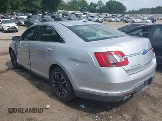 2011 Ford Taurus SE with VIN 1FAHP2DW9BG179423, listed as a IAAI auction lot 39683731 with 297,445 mi miles. Bid and sale history available at carsss.com. Image 3.
