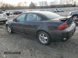 2001 Pontiac Grand Am GT with VIN 1G2NW52E61C212612, listed as a Copart auction lot 48007425 with 182,966 mi miles and Salvage Title. Bid and sale history available at carsss.com. Image 2.