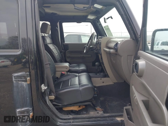 2008 Jeep Wrangler Rubicon with VIN 1J8GA69128L547347, listed as a IAAI auction lot 41985787 with 151,461 mi miles and . Bid and sale history available at DreamBid. Image 5.