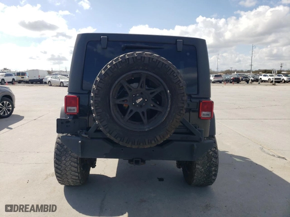 2015 Jeep Wrangler Unlimited Sport with VIN 1C4BJWDG2FL639049, listed as a Copart auction lot 43604925 with 139,716 mi miles and Salvage Title. Bid and sale history available at carsss.com. Image 6.