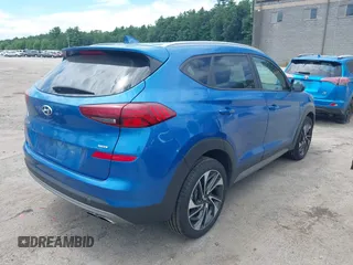 2019 Hyundai Tucson Ultimate with VIN KM8J3CAL3KU891754, listed as a IAAI auction lot 39809087 with 95,967 mi miles. Bid and sale history available at carsss.com. Image 4.
