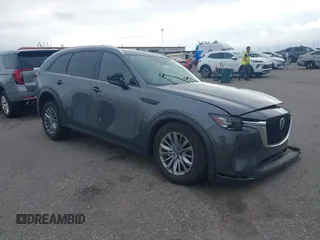 2024 Mazda CX-90 Preferred Plus z VIN JM3KKCHDXR1153544, wystawiony jako IAAI lot #42490144 z przebiegiem Nie podano mil oraz . Historia ofert i sprzedaży dostępna na DreamBid. Obrazek 1.