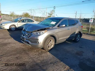 2018 Hyundai Santa Fe 2.4L z VIN 5NMZTDLB8JH098926, wystawiony jako IAAI lot #41816513 z przebiegiem 92 920 mil mil oraz . Historia ofert i sprzedaży dostępna na DreamBid. Obrazek 18.