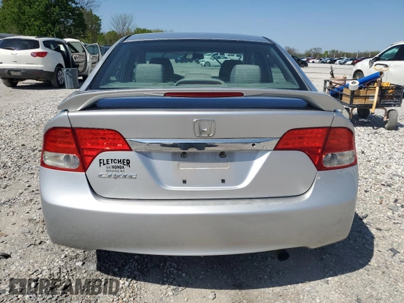 2010 Honda Civic LX with VIN 19XFA1F51AE016877, listed as a Copart auction lot 52275475 with 217,152 mi miles and Salvage Title. Bid and sale history available at DreamBid. Image 6.