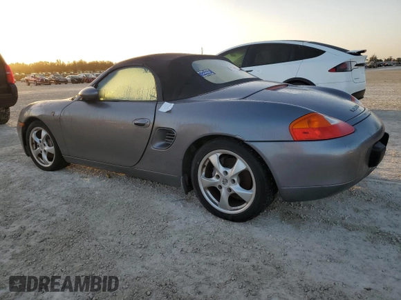 2001 Porsche Boxster с VIN WP0CA29871U627108, выставлен на аукционе Copart как лот 43968805 с пробегом Не указан миль и Списание • Salvage title. История ставок и продаж доступна на DreamBid. Изображение 2.
